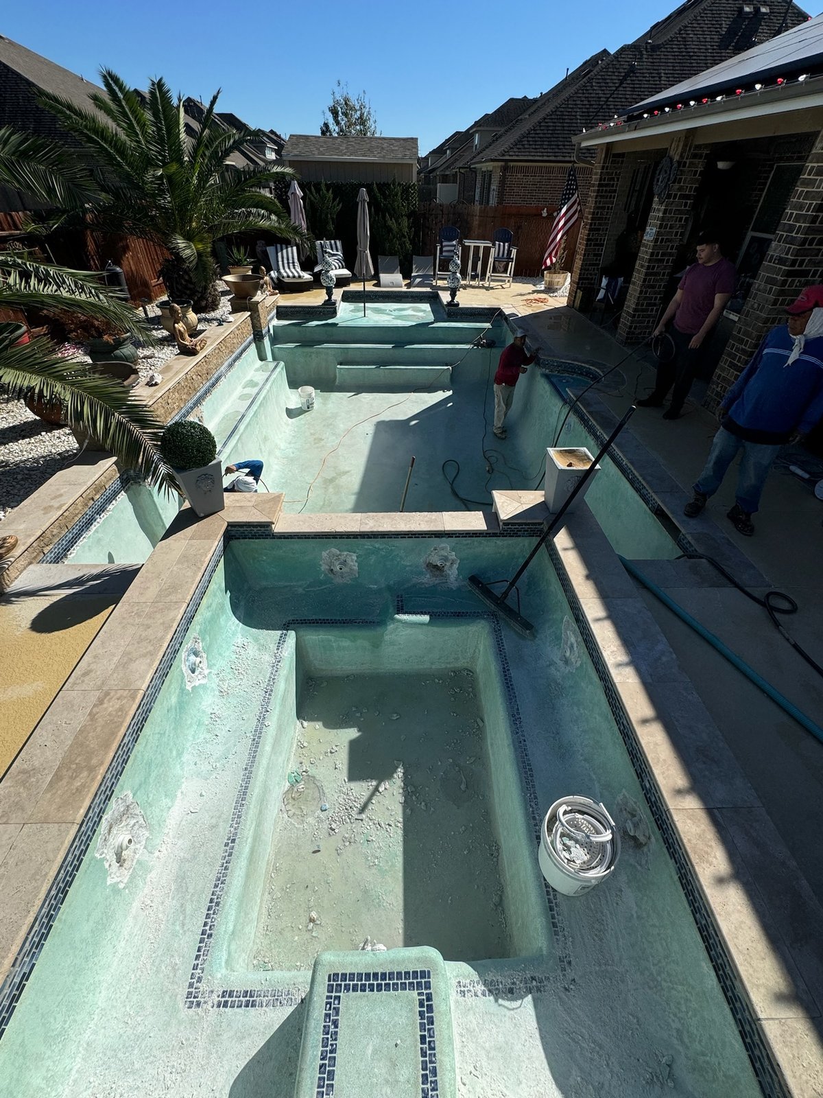 Rectangular pool and raised spa before