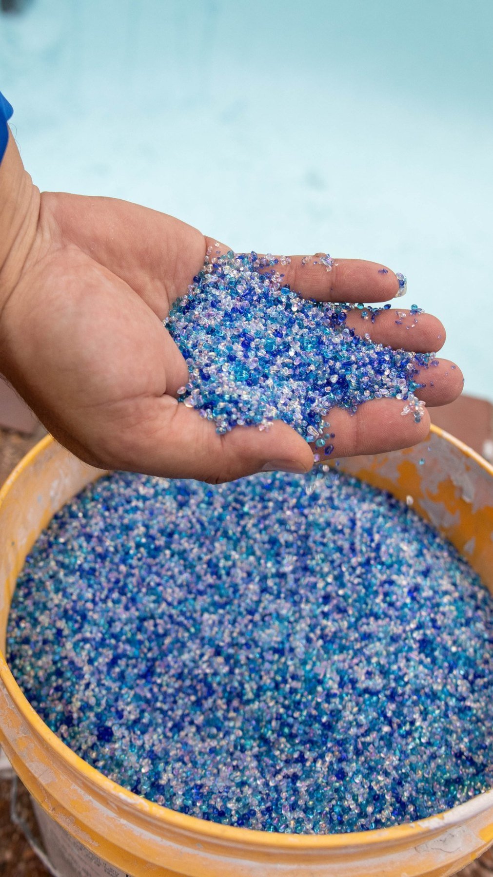 Blue and purple glass-bead pool finish